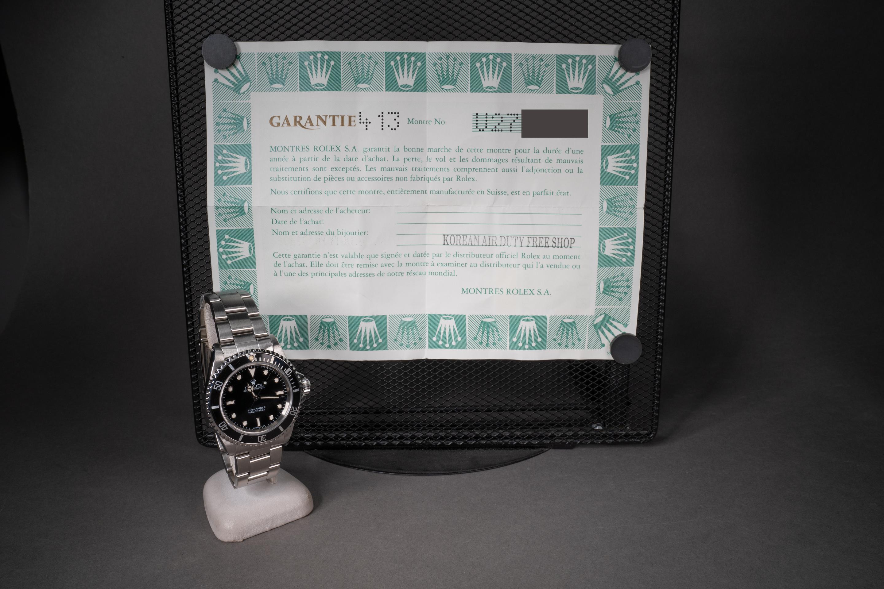 FS 1998 Rolex Submariner 14060 with Papers From Korean Air Duty